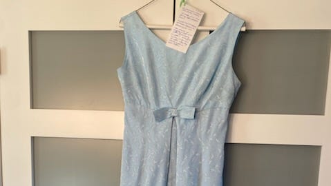 Help solve the mystery of a 1964 prom dress given to history center sale