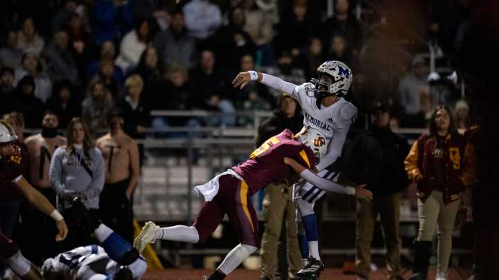 Photos of IHSAA football showdown between Memorial and Gibson Southern
