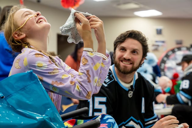 Photo gallery: Utah Mammoth share early Thanksgiving joy with young Primary Children’s kids