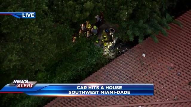 Driver hospitalized after crashing into home in SW Miami