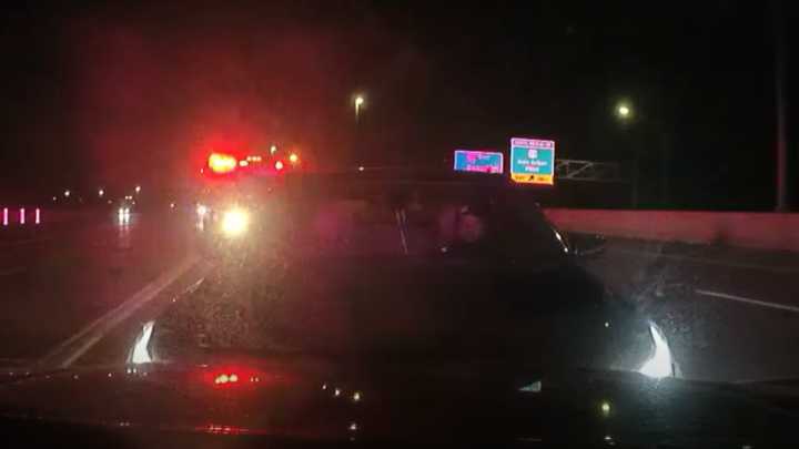 Video: Driver stopped on highway pushes Mich. sheriff's office cruiser into traffic