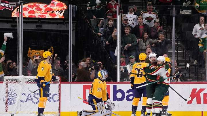 Johansson scores in OT with goal off its moorings in Wild's 3