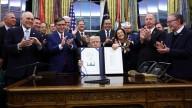 Trump signs bill to end govt shutdown, blames Dems for flight, paycheck delays