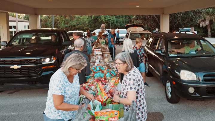 See photos: Advent Lutheran Church offers weekly food distribution