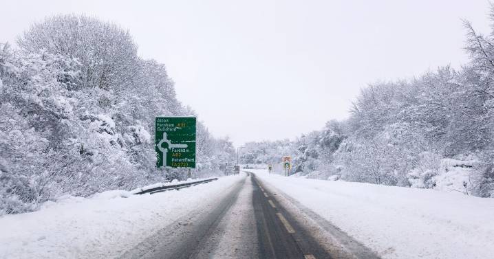Cold weather maps turn purple as snow stretches 520 miles across Britain 