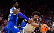No. 11 Louisville holds off No. 9 Cats 96