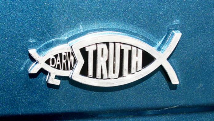 Atheist Driver Spots Jesus Fish Eating Darwin Fish, Repents