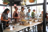 Volunteers serve up Thanksgiving meals to hundreds at North Portland restaurant