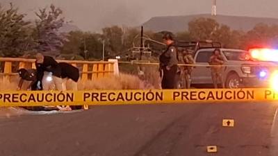 Localizan a dos hombres asesinados en puente del Piggy Back