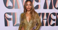 Victoria Monet Is a Golden Goddess in Sheer Roberto Cavalli Gown