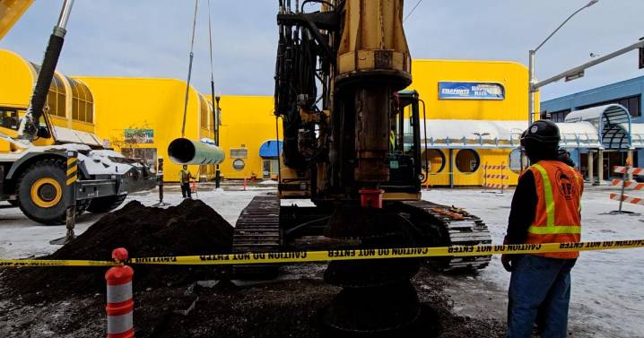 Installation of downtown Anchorage’s Mushing District’s arch begins