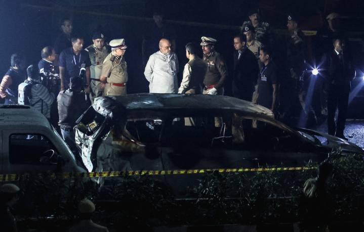 Car explodes near historic fort in India's capital, killing at least 8 people, police say