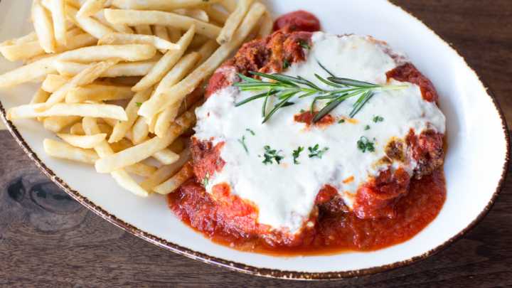 Chicken Parmesan Gets Far Creamier With An Easy Cheese Swap