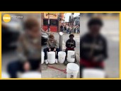 The godmother of drumming jamming out with a street performer