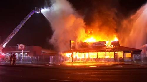 Abandoned building destroyed by fire in central Fresno