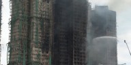Dozens more bodies recovered after Hong Kong blaze, raising death toll to 128
