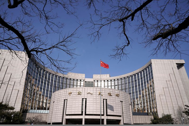 China's October new bank loans fall sharply, missing forecast
