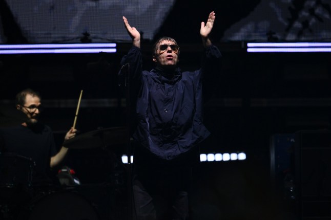 Liam Gallagher launches foul-mouthed rant at fan who let off flare during Oasis stadium show