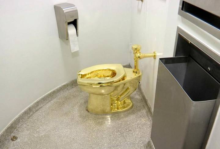 Flush with cash? A solid gold toilet is up for auction