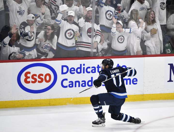 Jets sign captain Adam Lowry to five-year, US$25M contract extension