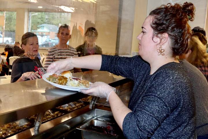 Salvation Army, volunteers serve community meals