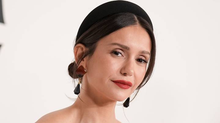 Nina Dobrev puts her strong abs on display in bra and leggings for workout video