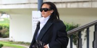 Rihanna Steps Out in Chic Black Suit and Sculptural Blouse