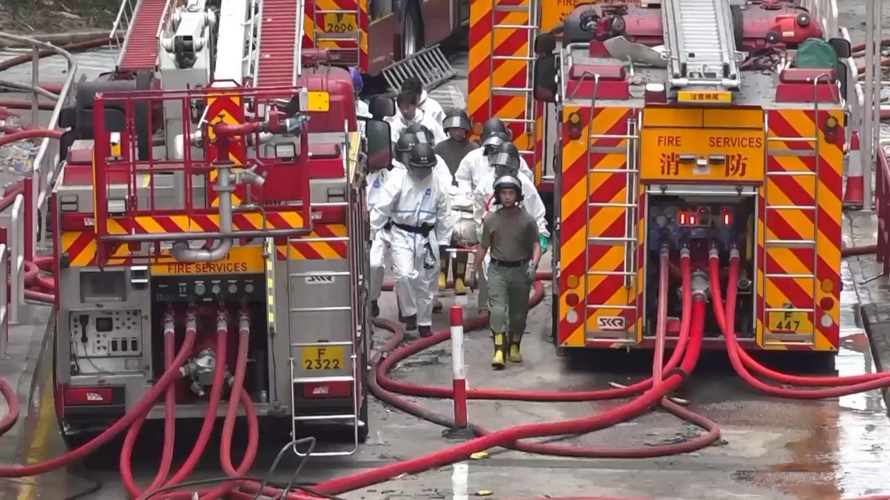 Bodies carried away after deadly Hong Kong fire claims 128 lives and sparks safety crackdown