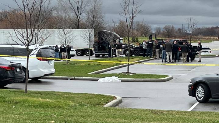 Man dead after being shot by IMPD officers in Franklin parking lot