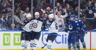 Morrissey and Hellebuyck lead Jets past Canucks 5