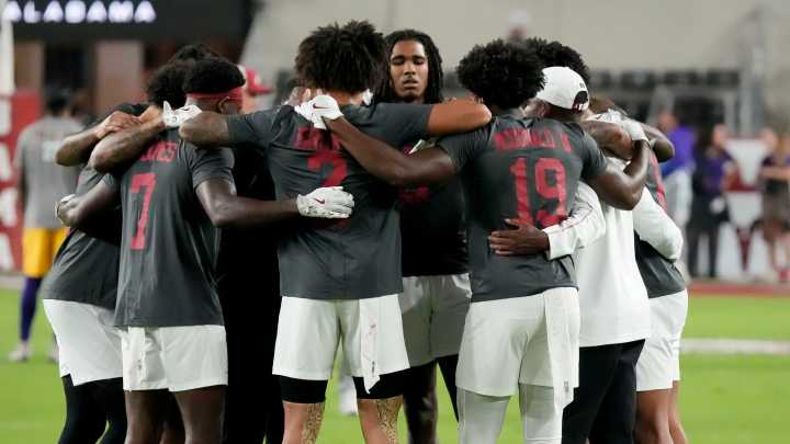 LSU fan handcuffed, removed after storming field in Alabama football game