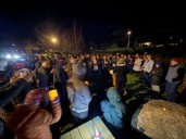 Supporters of Ali Faqirzada call for his release by candlelight