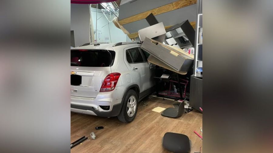 Vehicle slams into T-Mobile store in Bartlett: Photos