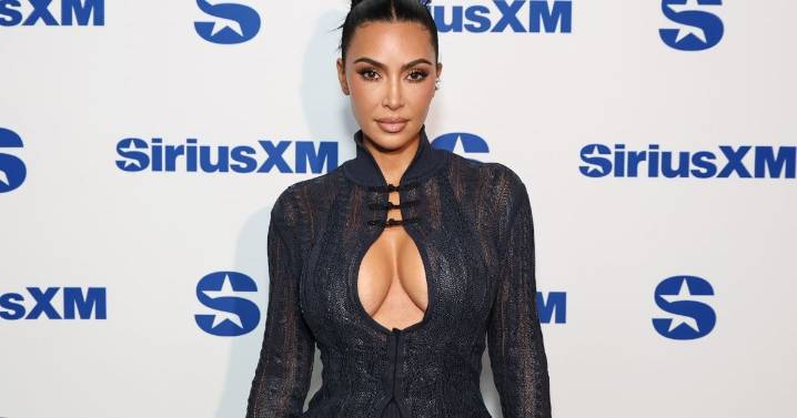 Photos: Kim Kardashian's Bold Slit Dress Look Is 'Beyond'