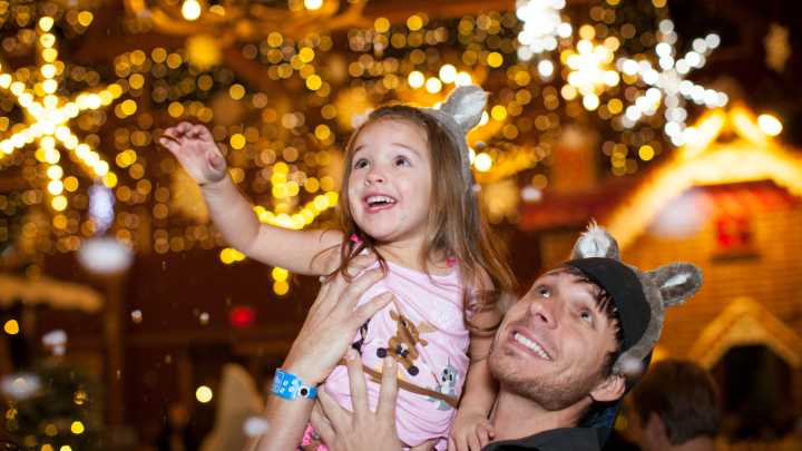How does Great Wolf Lodge celebrate the holidays at their resorts?