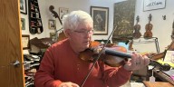 Retired Iowa State University professor repairs violins to pay forward goodwill