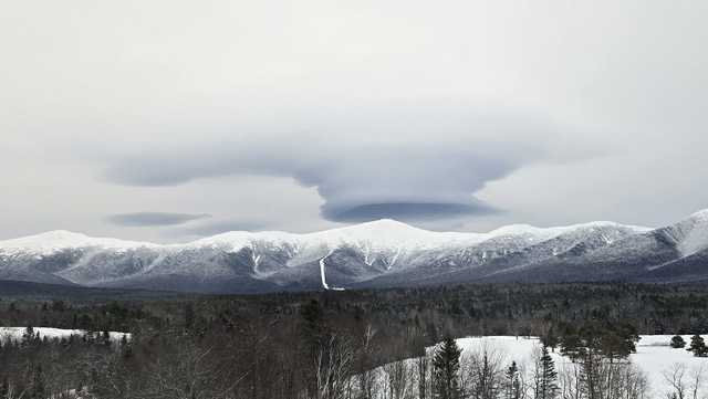 UFO-like lenticular cloud forms over White Mountains