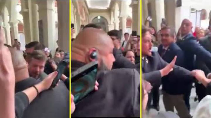 Graban momento en que hombre da palmadas a Johannes Kaiser y guardia lanza un puño