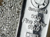 Silver hits record after topping peak from October squeeze