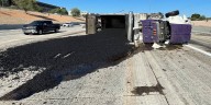 Dump truck overturns, spills hot asphalt on Loop 101 in Scottsdale