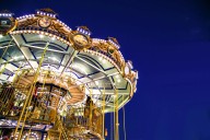 NYC Gets Its First-Ever Double-Decker Carousel On 34th Street For The Holidays & It’s Like Stepping Into A Snow Globe