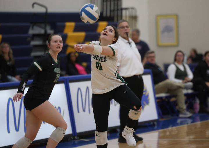 Photos of Birmingham Groves vs. St. Clair Shores Lakeview in a D1 volleyball regional semifinal