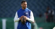 Russell Wilson wants to stay with the Giants. He also wants to play in the NFL next season