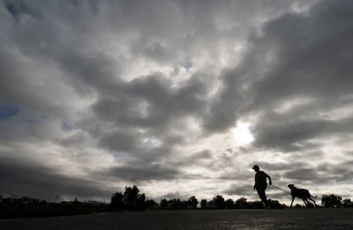 Flash floods, multiple rescues and 1 killed by a falling tree as storm rattles OC, LA