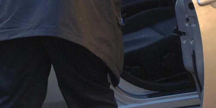 Video: Woman pulls male intruder out of her car, throws him to the ground with ease