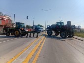 Termina bloqueo carretero, firman acuerdo
