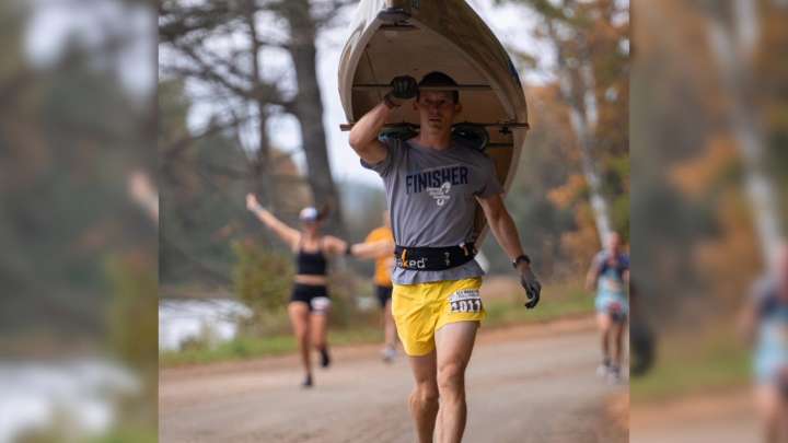 Fergus Falls man runs marathon with canoe overhead, sets record