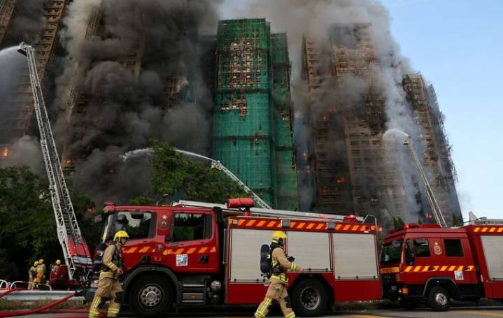 Blaze in Hong Kong towers kills 36 as crews battle flames