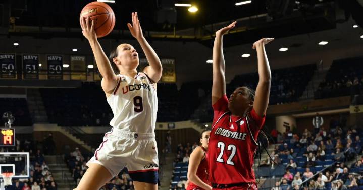 No. 1 UConn handles No. 20 Louisville in opening game