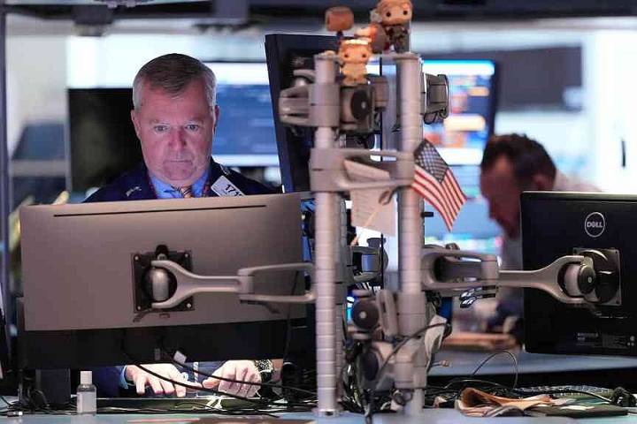 Wall Street slips under weight of tech, crypto losses